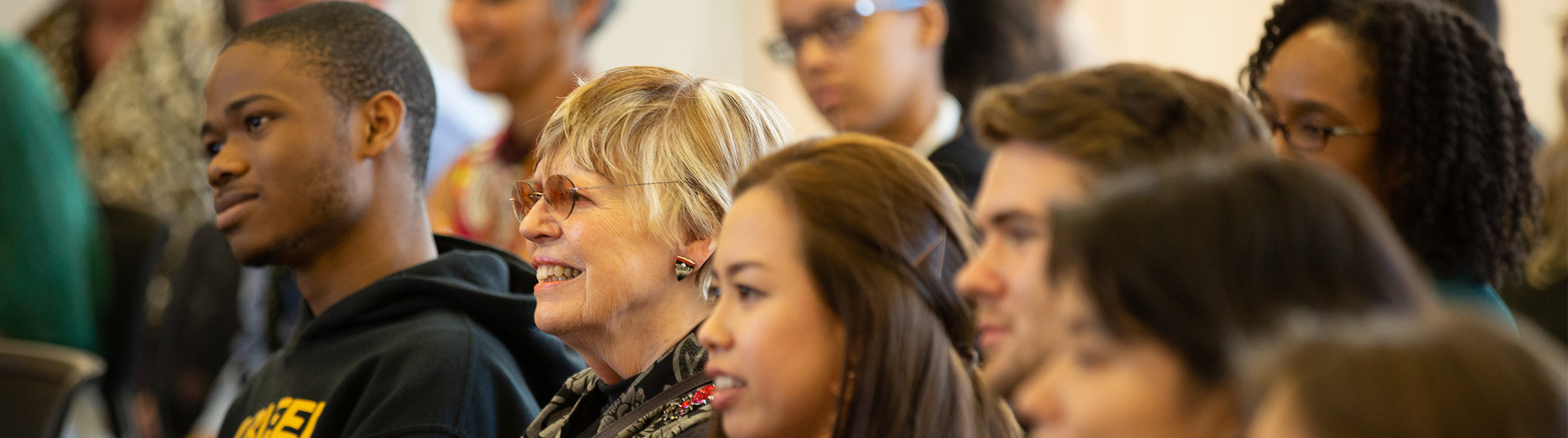 An close-up photo of the audience at an event.