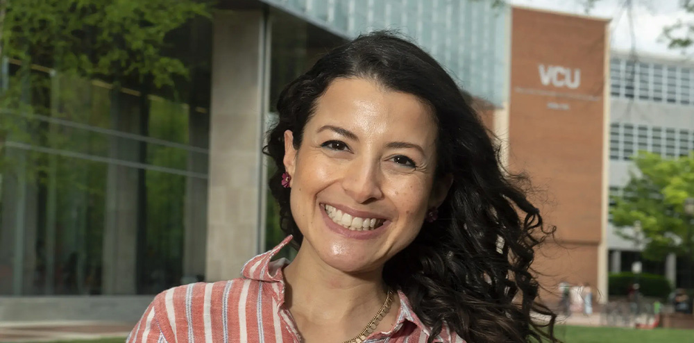 Monica Jimenez Sablich in front of James Branch Cabell Library.