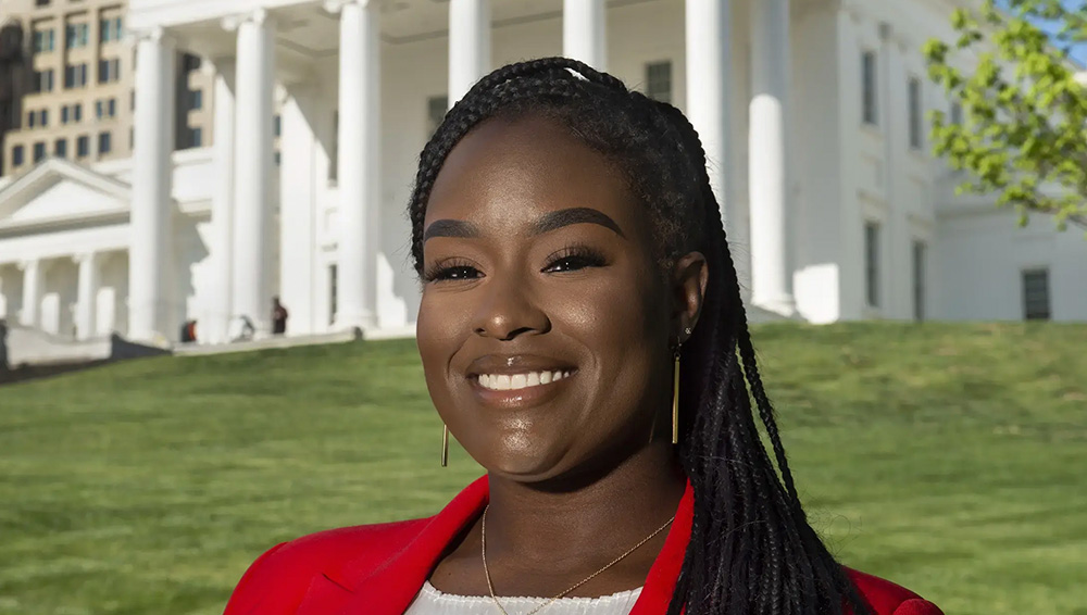 Whitney Brown in front of the Richmond Capitol building.